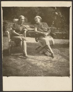 [Two Women Seated in Lawn Chairs] by Louis Fleckenstein