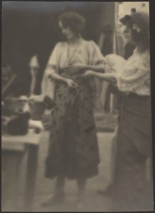Two Women Standing in Studio by Louis Fleckenstein