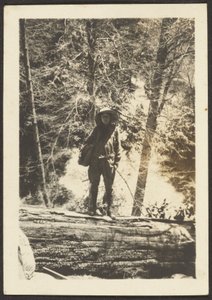 Woman Standing on Fallen Tree by Louis Fleckenstein