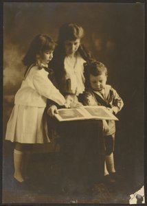 Woman and Children with Picture Book by Louis Fleckenstein