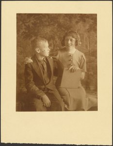 Woman and Young Man Seated Before Tapestry by Louis Fleckenstein