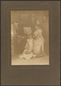 Woman at a Piano with Children by Louis Fleckenstein