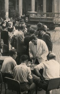 Waiting Tables, in the Background a U.S. Army Truck