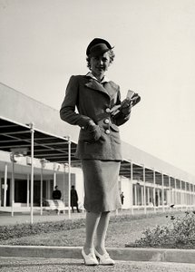 Model in a suit created by the couture house Graldi by Luis Bogino