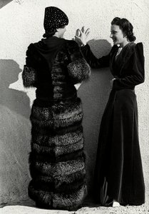 Two models present creations of the Italian couture house 