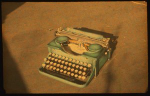 Still life color photograph of a typewriter taken with Autochrome Lumière and a 35mm camera by Luis Marden