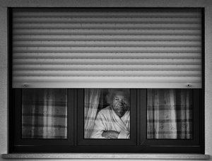Solitary Woman Window by Maciej Przeklasa