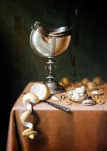 A Still Life with a Nautilus Cup, a peeled Lemon and Walnuts by Maerten Boelema de Stomme