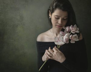 Serene Woman with Orchids