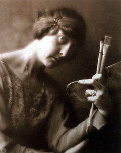 Half-length portrait of the painter Elisabeth Chaplin. She is holding two brushes and a palette in her left hand