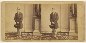 [Unidentified young man holding a top hat and walking stick, standing] by Mathew B. Brady