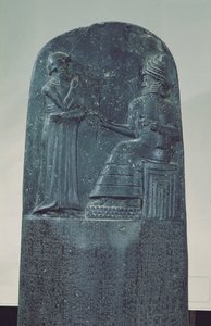 Relief Figure of the Sun God Shamash dictating his laws to King Hammurabi on his Famous Law Code, Old Babylonian Period by Mesopotamian