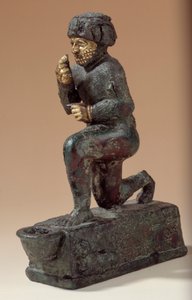 Mesopotamia: Statuette in silver, bronze and gold of kneeling worshiper, ex-voto dedicated to the god Amurru for the life of Hammurabi. 1800 BC. From the Larsa site by Mesopotamian Mesopotamian