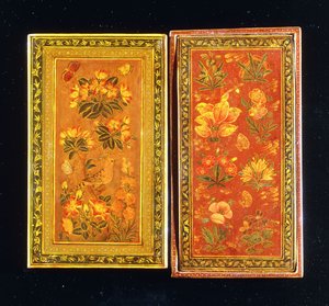 A Pair of Safavid Dynasty Mirror Cases, Painted with Floral Designs, One with a Perched Hoopoe