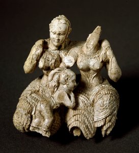 Ivory Idol Composed of Two Deities and a Child