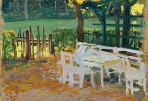 Garden Corner in Front of Wooden Fence and Meadow