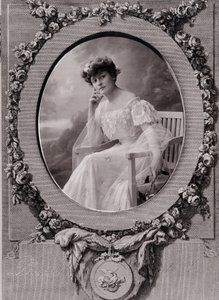 Portrait of a Lady Sitting on an Oval Bench in a Background Decorated with Flowers by Paul Nadar