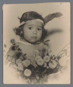 Portrait of an Unknown Child with a Headband and a Bouquet of Flowers by Paul Rollman