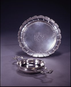 George II orange strainer, circular bowl with two openwork shell and scroll handles