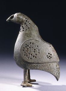 A Persian bronze incense burner in the form of a bird, 12th century
