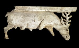 Civilization of the Phoenicians: ornament of a royal ivory bed in the shape of a deer, from the site of Arslan Tash (Syria). 9th century BC. Paris, Musee du Louvre by Phoenician