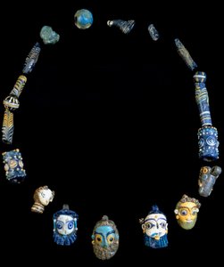 Necklace in glass paste with pendants depicting bearded heads, originally from Olbia, National Archeological Museum of Cagliari