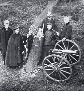 Hiram Maxim demonstrating the power of his gun to Chinese government officials by Photographer English