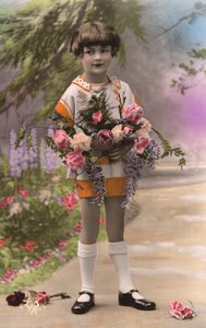 Young French Boy Holding Roses
