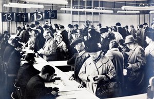 East German citizens queuing to obtain permits to visit relatives in the West by Photographer German