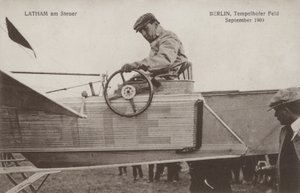 French Aviator Hubert Latham at the Controls of His Aeroplane, Tempelhof Airfield, Berlin, September 1909 by Photographer German
