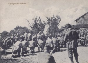German army soldiers participating in an open air church service by Photographer German