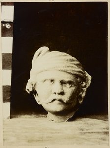 Taxila, Chir Tope [Dharmarajika Stupa]. Stucco Head
