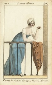 Woman on the balcony at the theatre with opera glass
