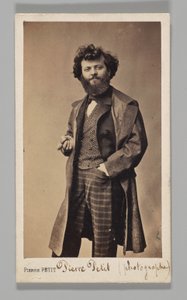 Studio Portrait: Self-Portrait Wearing Plaid Pants and Overcoat by Pierre Petit