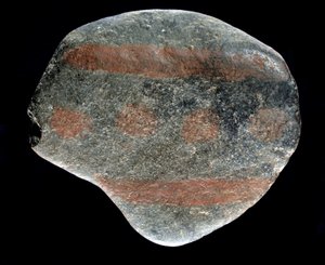 Prehistory: painted pebble from the time of the Azilian