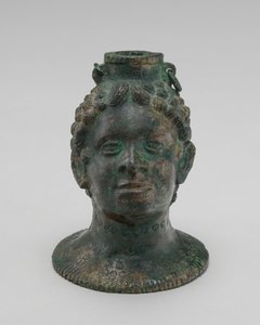 Container in the Form of an African