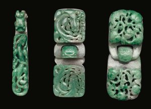 A group of jadeite belt hooks and buckles by Qing Dynasty Chinese School