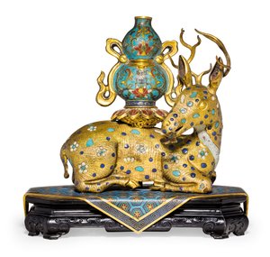 A pair of recumbent deer by Qing Dynasty   Qianlong Period Chinese