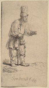 A Peasant in a High Cap, Standing Leaning on a Stick by Rembrandt van Rijn