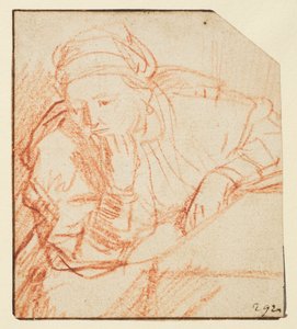 Saskia seated at a table by Rembrandt van Rijn