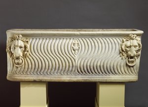 Marble strigilated sarcophagus
