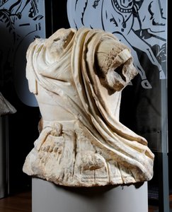 Sculpted torso of a cavalryman thought to be a copy of an original bronze statue of Alexander the Great by Roman