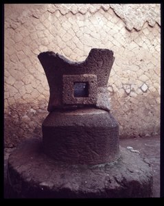 Grindstone of the Pistrinum (Bakery) by Roman Roman
