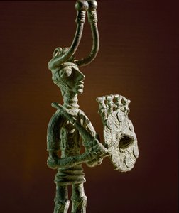 Statuette of a warrior with a shield and a bronze sword. 8th-7th century BC. Museo Nazionale Archeologico, Cagliari, Sardinia, Italy by Sardinia Nuragic Civilization