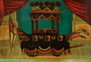 Wheeled coach decorated in gold and black