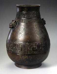 A Hu Vase with Cast Decoration