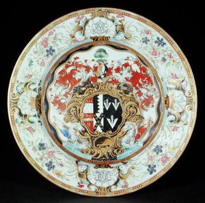 Dinner plate painted in famille rose enamels in the Rococo style with the arms of Leake Okeover Esq., Kangxi period (1662-1722)