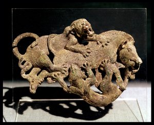 Ornamental plaque depicting a wild boar struggling with two tigers, from Tomb 3 at Shih-chai-shan, Yunnan Province, Western Han Dynasty, 2nd-1st century BC