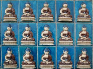Small Buddhas wall in the island of Hydrangeas (Qionghua) at Beihai Park or North Sea Park in Pekin. Photography, Leonard de Selva, China, 2006 by School Chinese