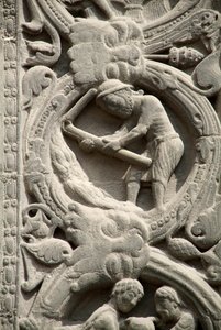 Gothic Art: Pieright of the right gate of the western facade of the Basilica of Saint Denis, representing the work of the fields: August. Saint-Denis, France